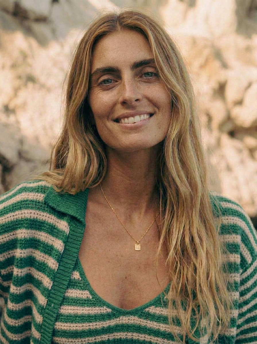 Knitwear chapter - smiling portrait, cliffside light, AI generated and art directed by me