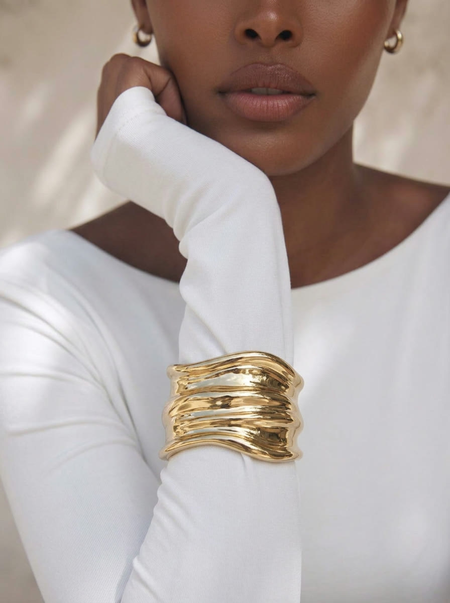 Product macro - sculpted gold cuff, AI generated and art directed by me