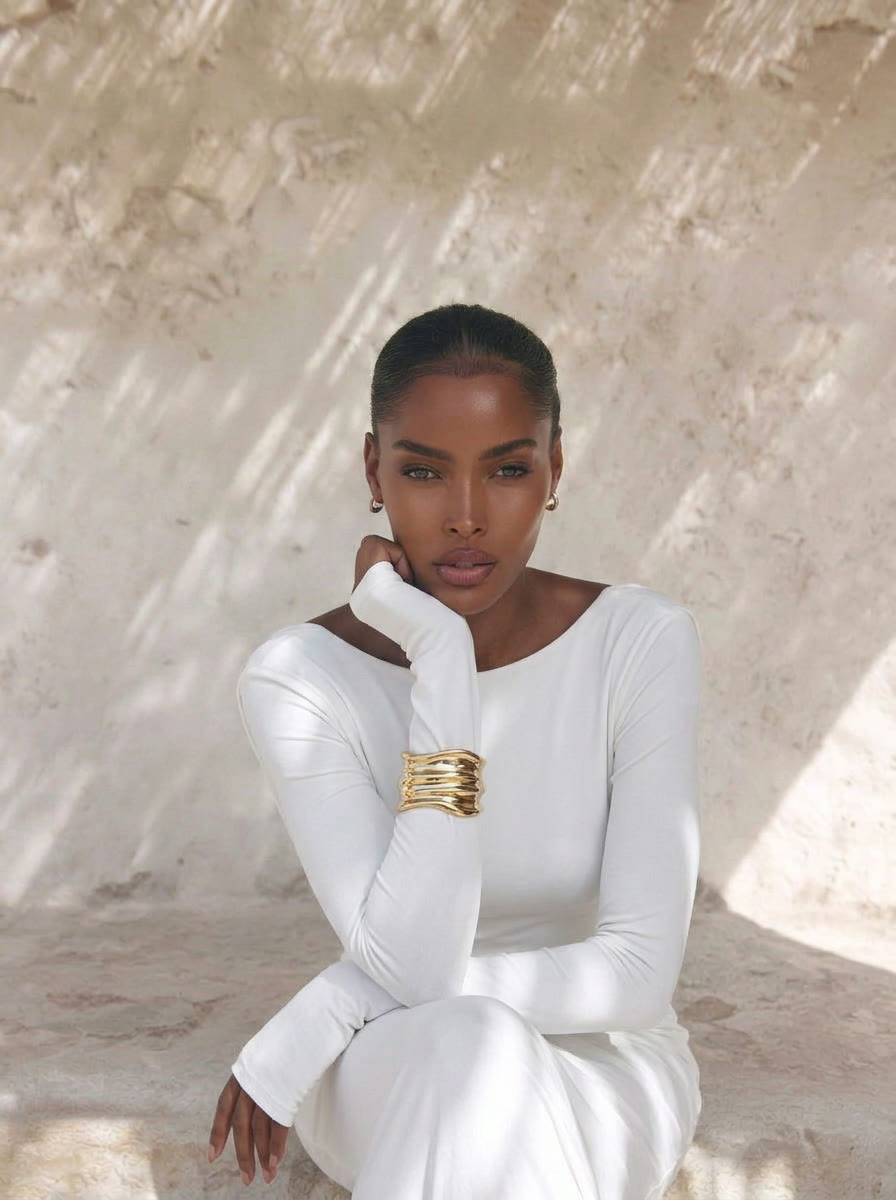 Portrait crop - stacked gold cuff in focus, AI generated and art directed by me